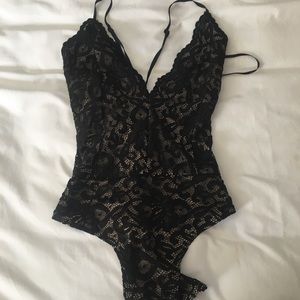 Lulu’s black lace bodysuit
